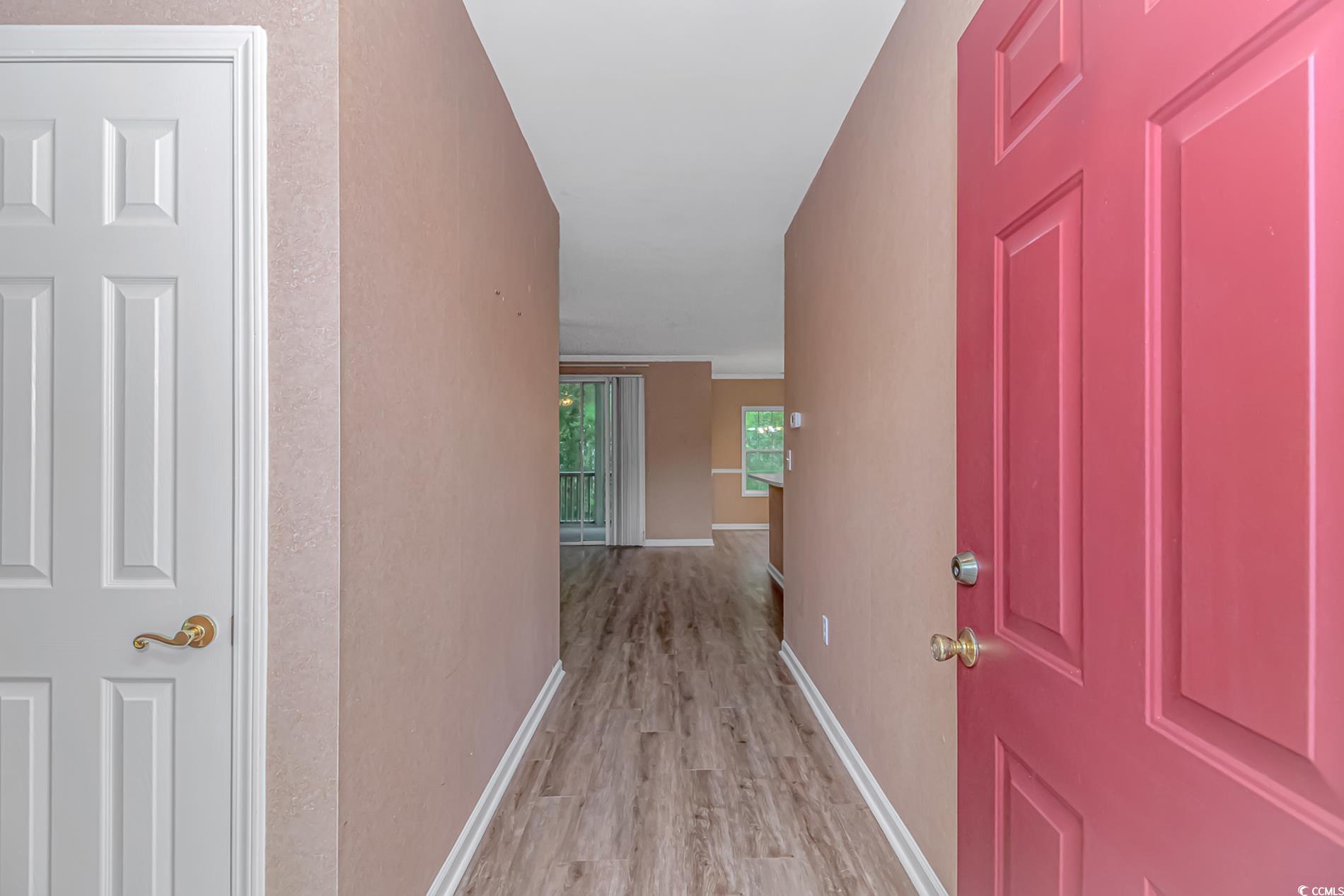 4814 Innisbrook Court, Unit 407 Myrtle Beach, SC 29579 - Photo 4 of 31 Hall featuring light wood-type flooring and baseboards