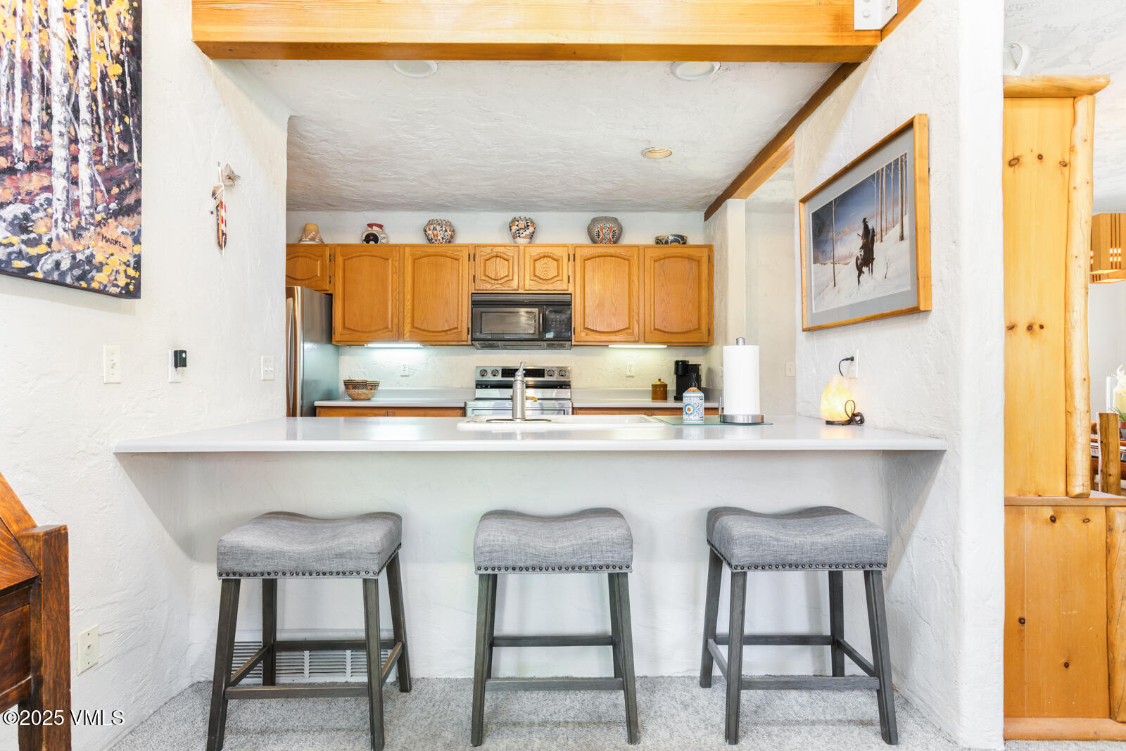 20 Hereford Road Edwards, CO 81632 - Photo 15 of 32 a kitchen with stainless steel appliances a sink and a refrigerator