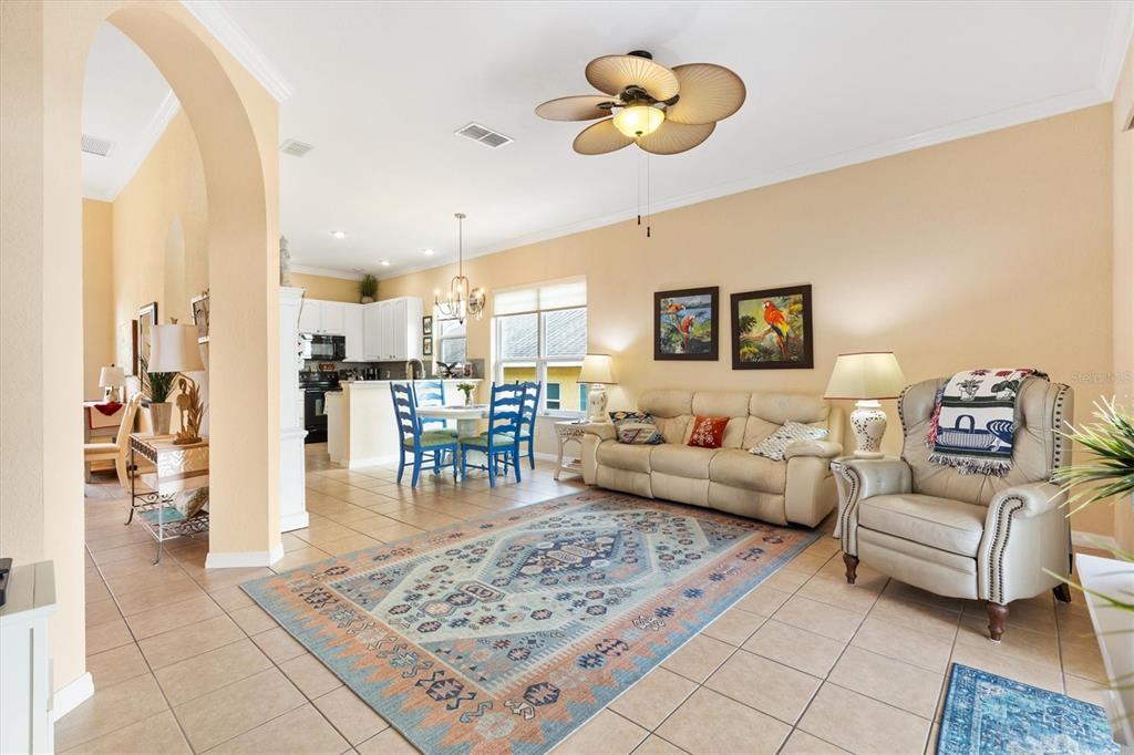 17031 Southeast 115th Terrace Road Summerfield, FL 34491 - Photo 15 of 54 a living room with furniture and kitchen view