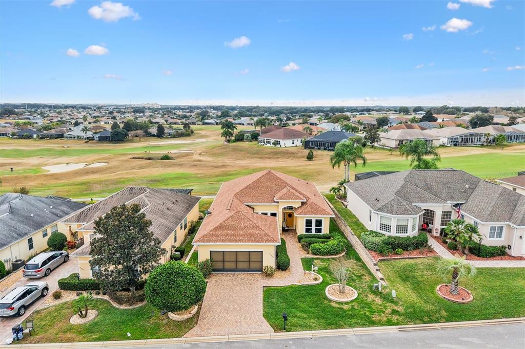 17031 Southeast 115th Terrace Road Summerfield, FL 34491 - Photo 35 of 54 an aerial view of residential houses with outdoor space and swimming pool