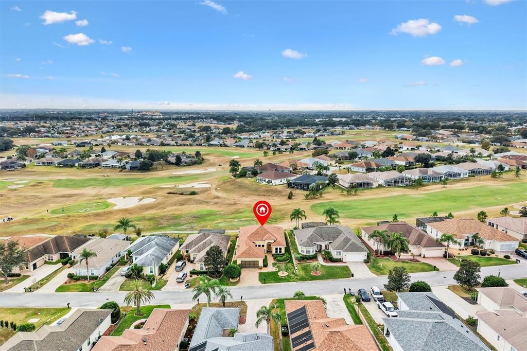 17031 Southeast 115th Terrace Road Summerfield, FL 34491 - Photo 37 of 54 an aerial view of residential building with outdoor space swimming pool and ocean view