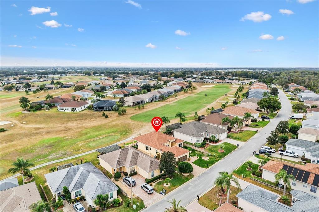 17031 Southeast 115th Terrace Road Summerfield, FL 34491 - Photo 39 of 54 an aerial view of residential houses with outdoor space