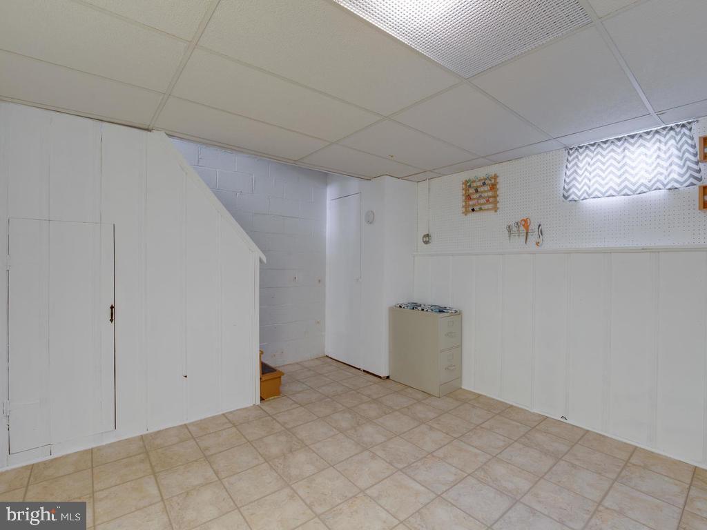 1623 Aberdeen Road Baltimore, MD 21286 - Photo 27 of 36 Finished basement is perfect for crafting