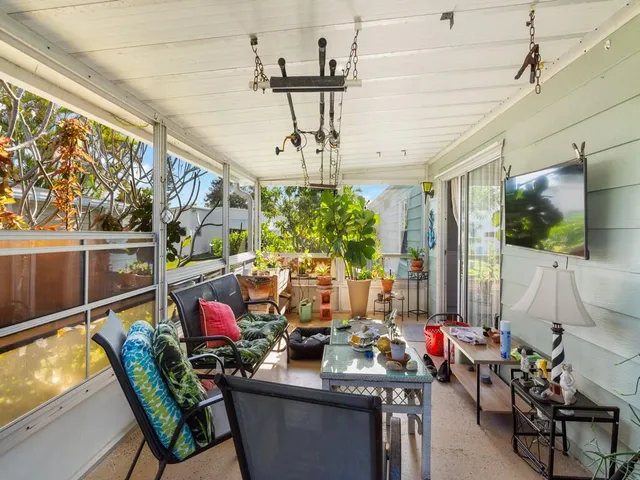 a view of a tables and chairs in patio