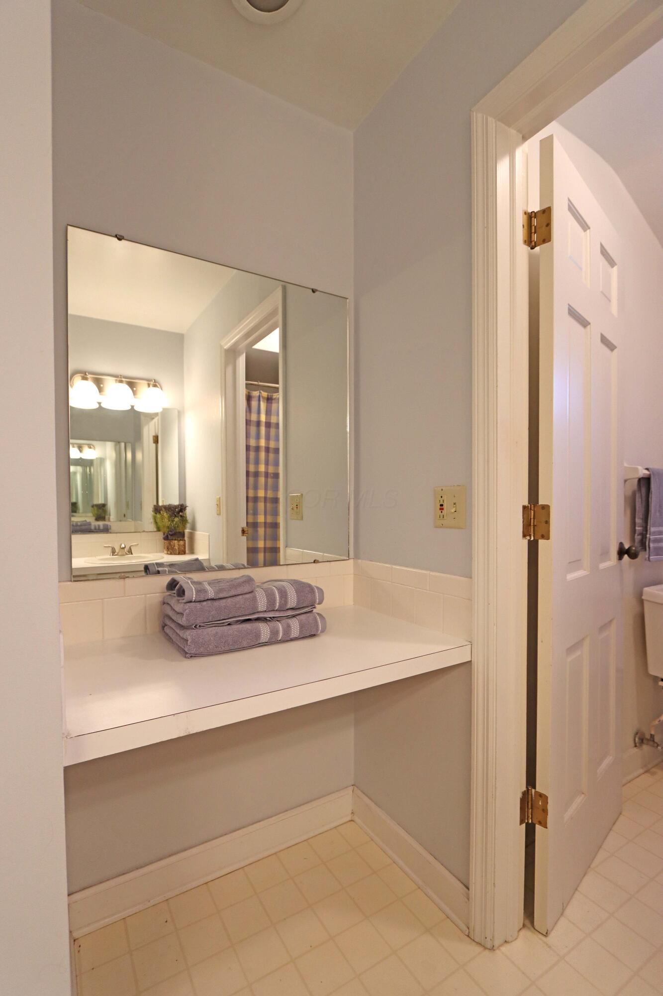3969 Newhall Road Upper Arlington, OH 43220 - Photo 42 of 82 built in makeup counter vanity in the hall bathroom