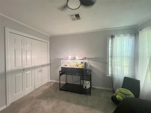 a room with furniture and window