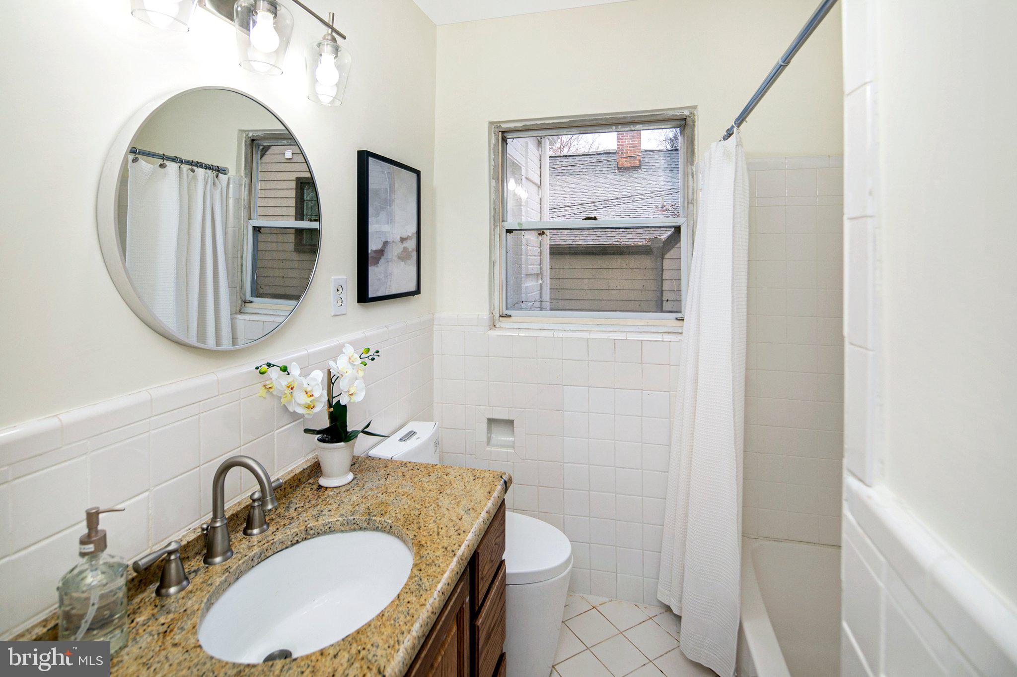426 Pershing Drive Silver Spring, MD 20910 - Photo 10 of 36 Bathroom adjacent to primary