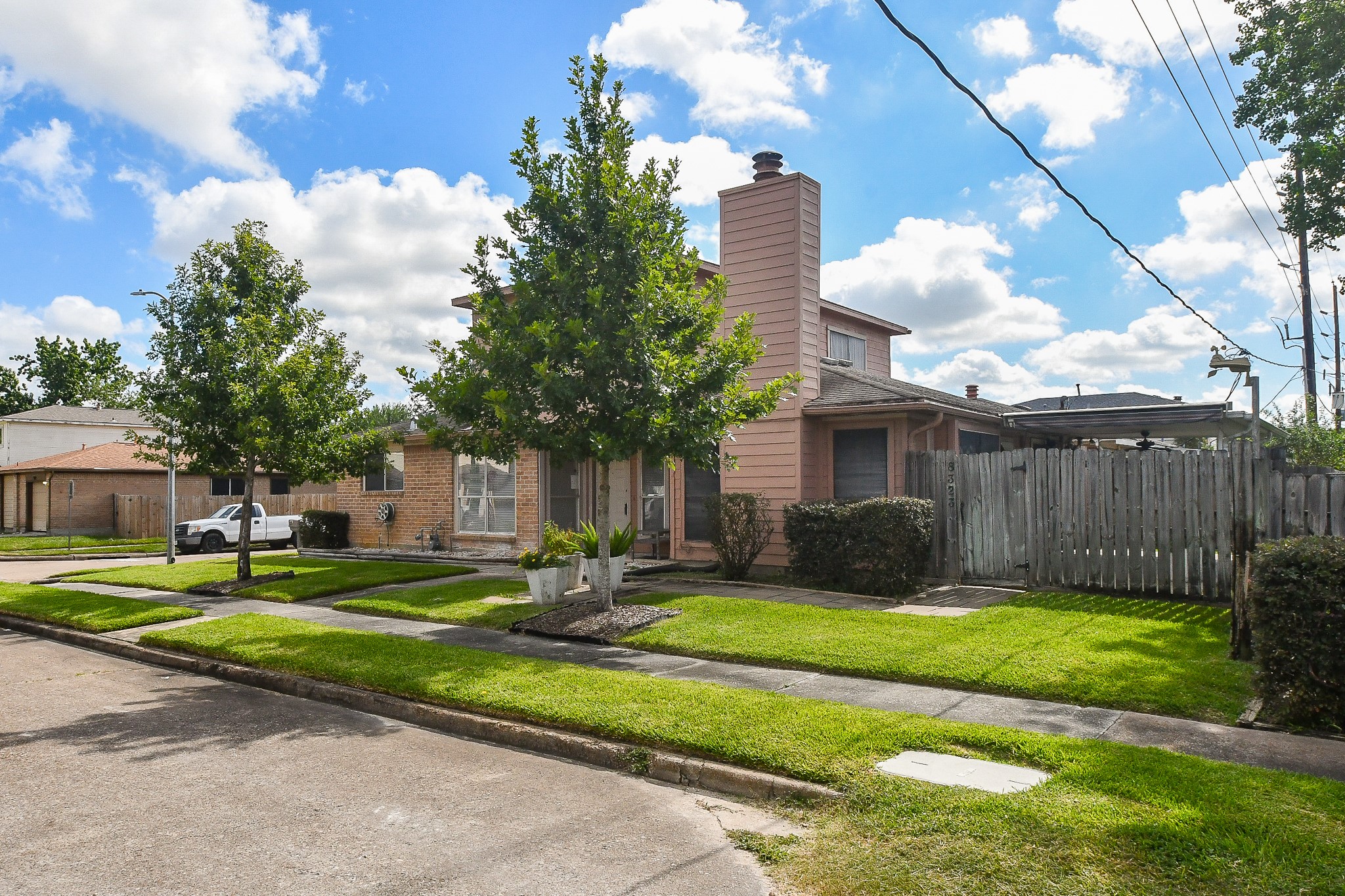 8323 East Ridge Drive Houston, TX 77040 - Photo 26 of 31 a front view of a house with garden