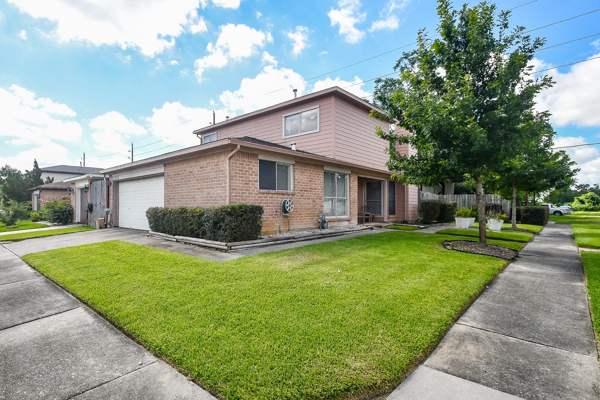 8323 East Ridge Drive Houston, TX 77040 - Photo 27 of 31 a front view of house with yard and green space