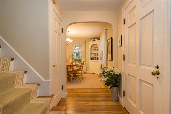 52 Paul Revere Road Lexington, MA 02421 - Photo 3 of 20 a view of a hallway with wooden floor and staircase