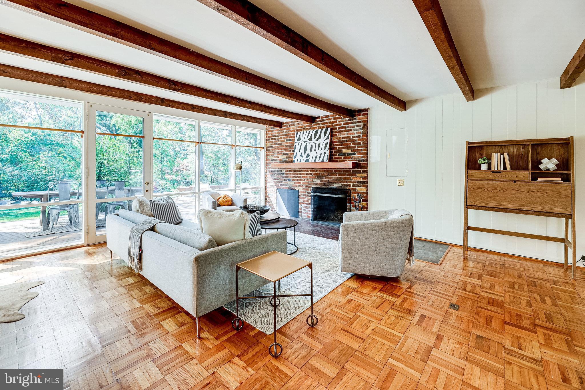 1952 Marthas Road Alexandria, VA 22307 - Photo 4 of 32 Walls of windows look onto yard and deck