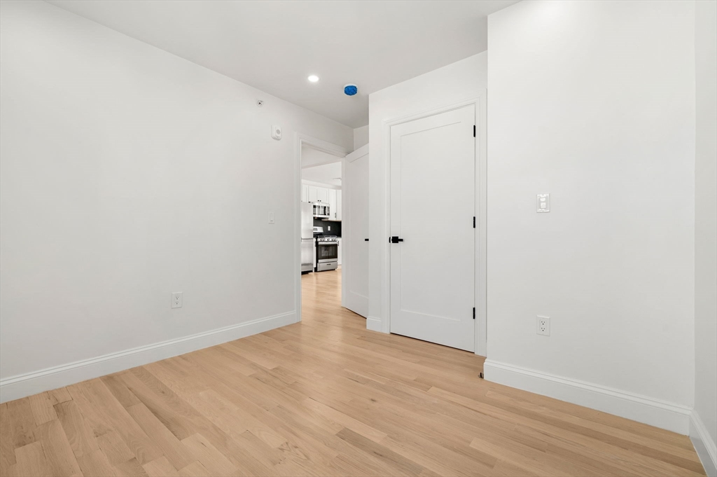 55 Dustin Street, Unit 3 Boston, MA 02135 - Photo 13 of 22 a view of an empty room