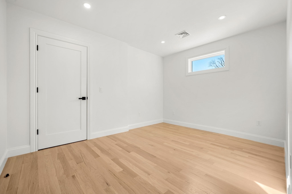 55 Dustin Street, Unit 3 Boston, MA 02135 - Photo 16 of 22 a view of an empty room