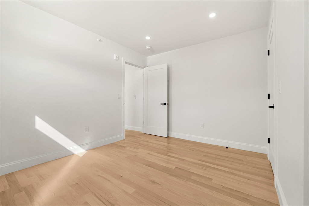 55 Dustin Street, Unit 3 Boston, MA 02135 - Photo 17 of 22 a view of an empty room