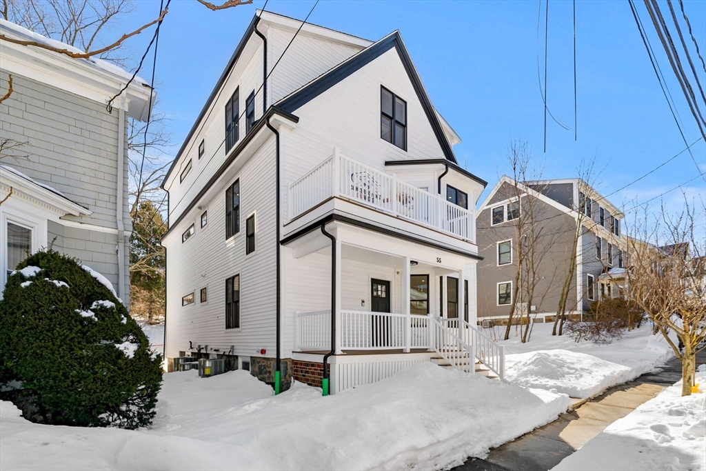 55 Dustin Street, Unit 3 Boston, MA 02135 - Photo 20 of 22 a view of a white house with a outdoor space
