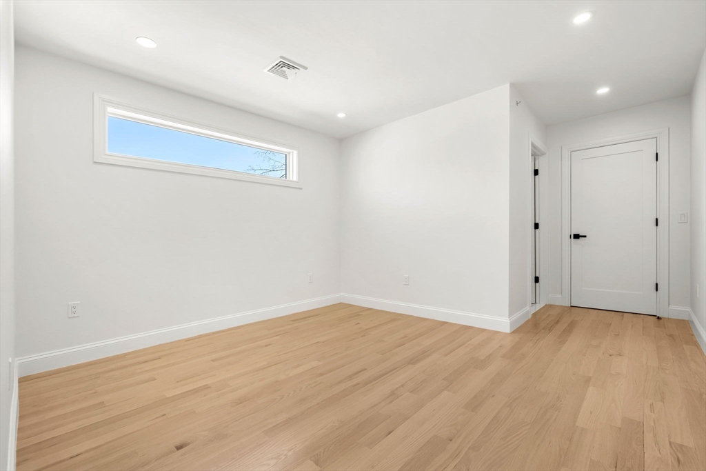 55 Dustin Street, Unit 3 Boston, MA 02135 - Photo 10 of 22 a view of an empty room