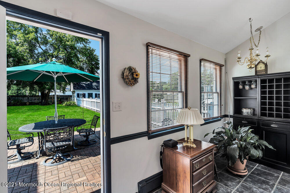 50 Lone Oak Road Middletown, NJ 07748 - Photo 11 of 38 a room with furniture and garden view