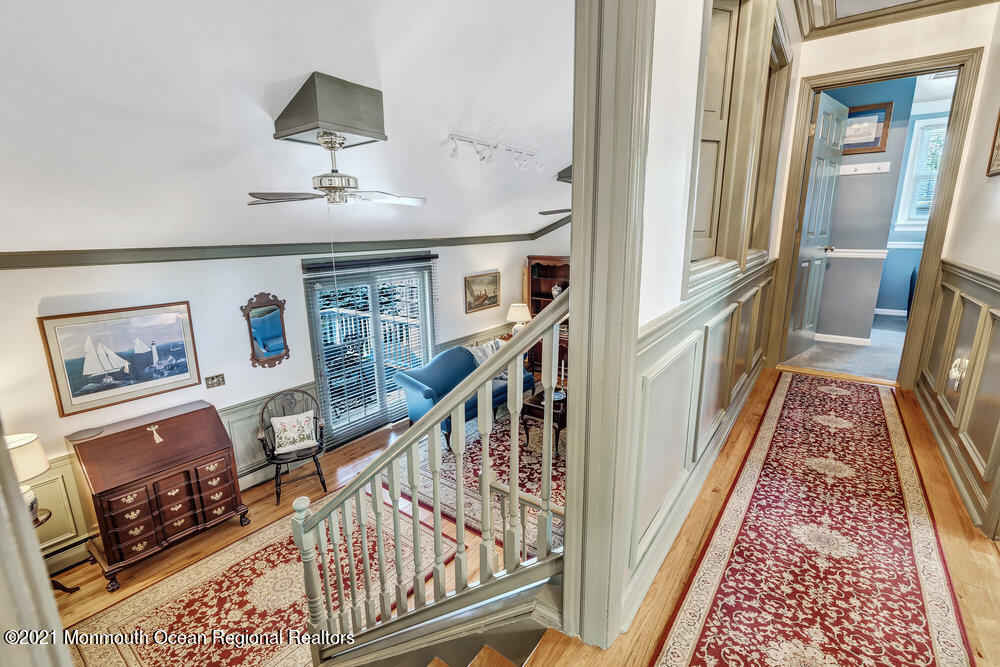 50 Lone Oak Road Middletown, NJ 07748 - Photo 2 of 38 a view of staircase with furniture and a rug