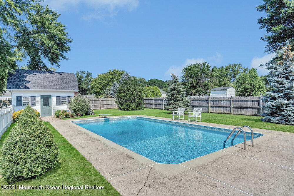 50 Lone Oak Road Middletown, NJ 07748 - Photo 21 of 38 a view of outdoor space yard swimming pool and patio