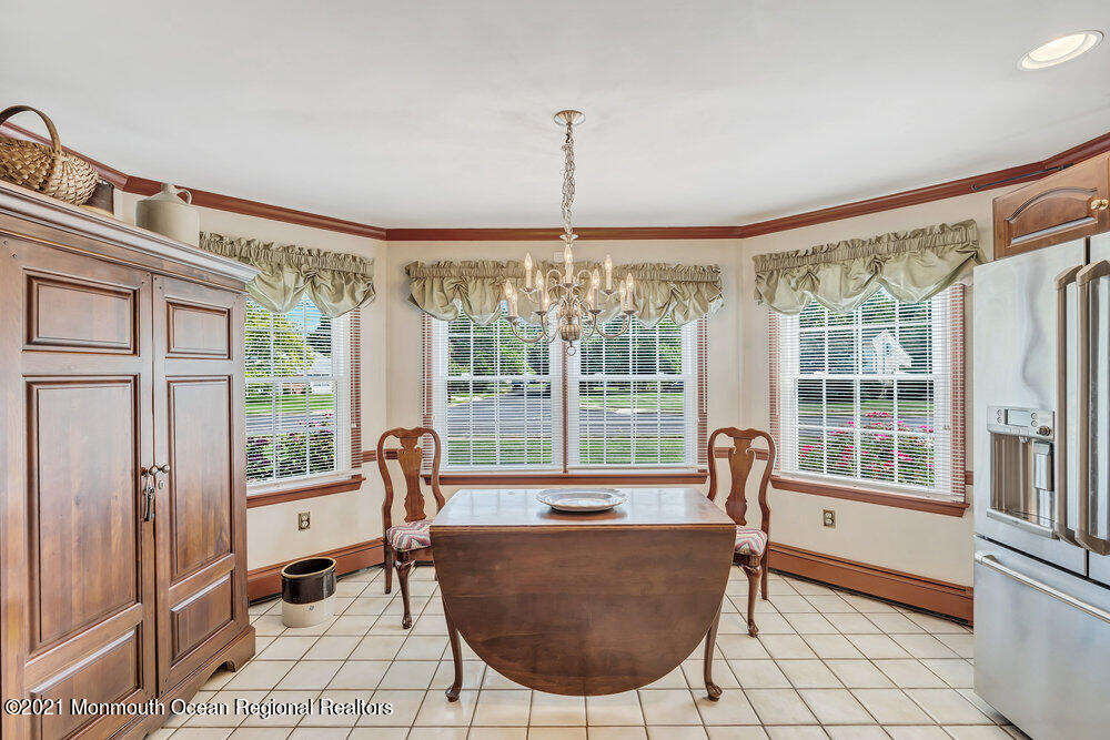 50 Lone Oak Road Middletown, NJ 07748 - Photo 27 of 38 a living room with furniture and a large window