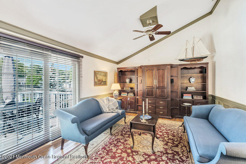 50 Lone Oak Road Middletown, NJ 07748 - Photo 35 of 38 a living room with furniture and a large window