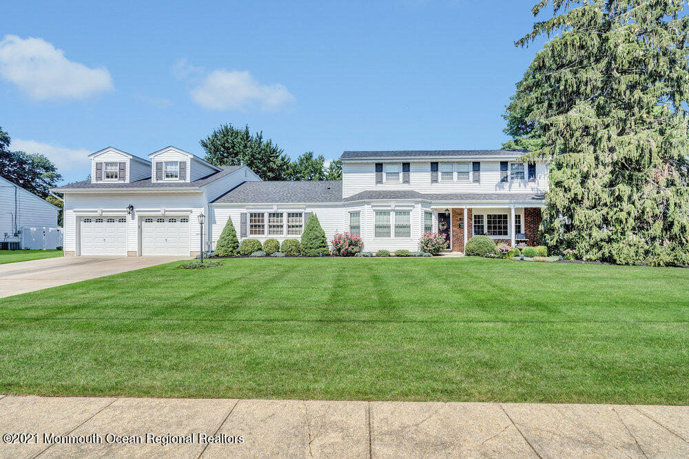 50 Lone Oak Road Middletown, NJ 07748 - Photo 38 of 38 a front view of a house with a garden