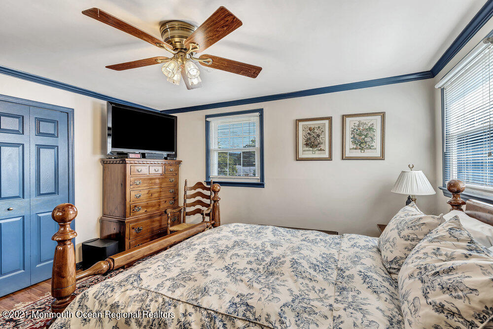 50 Lone Oak Road Middletown, NJ 07748 - Photo 4 of 38 a bedroom with a bed and a television