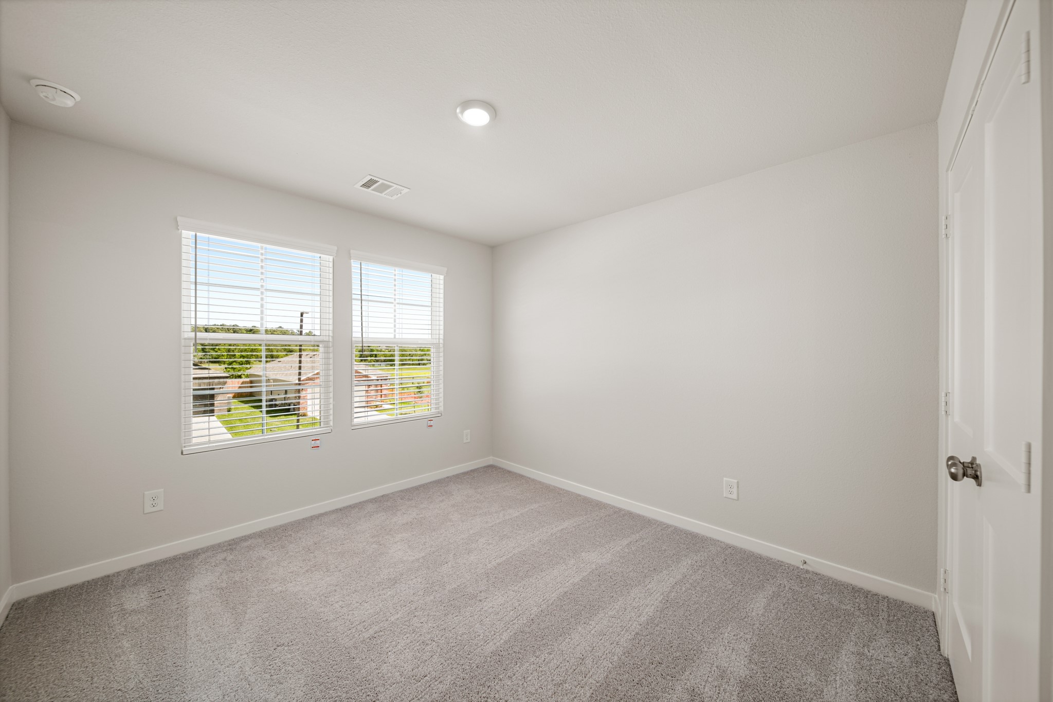 325 Bennett Street Angleton, TX 77515 - Photo 18 of 28 an empty room with a window