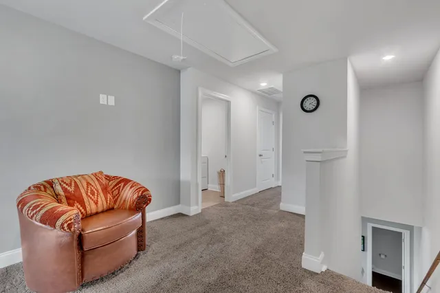 a living room with a couch and a couch