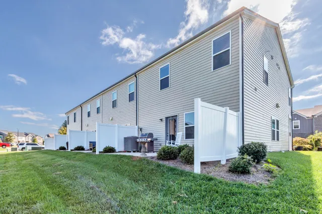 a view of a back yard of the house