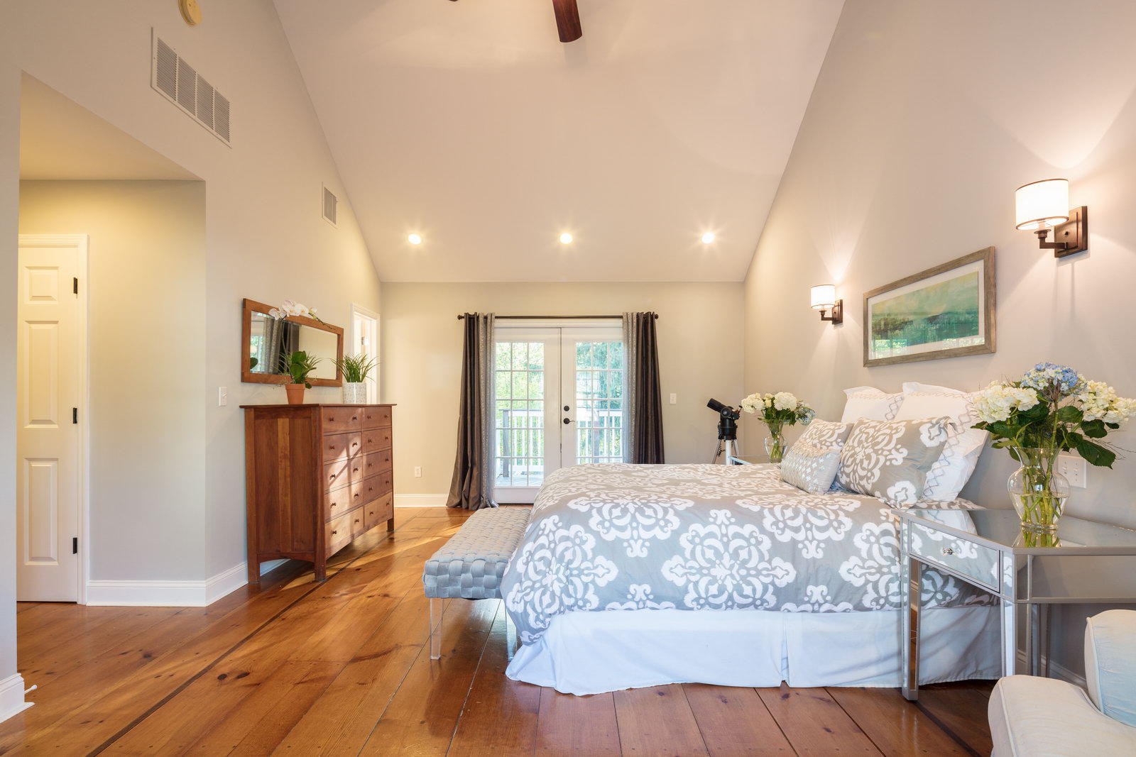 19 Birch Road Darien, CT 06820 - Photo 13 of 21 a bedroom with a large bed with wooden floor