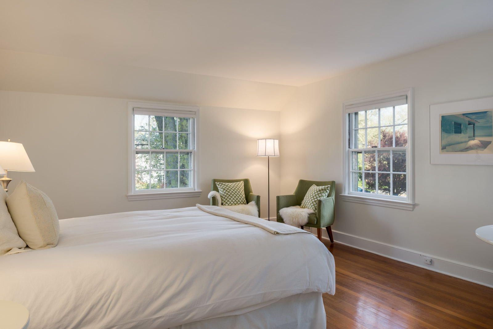19 Birch Road Darien, CT 06820 - Photo 18 of 21 a bedroom with a bed wooden floor and window