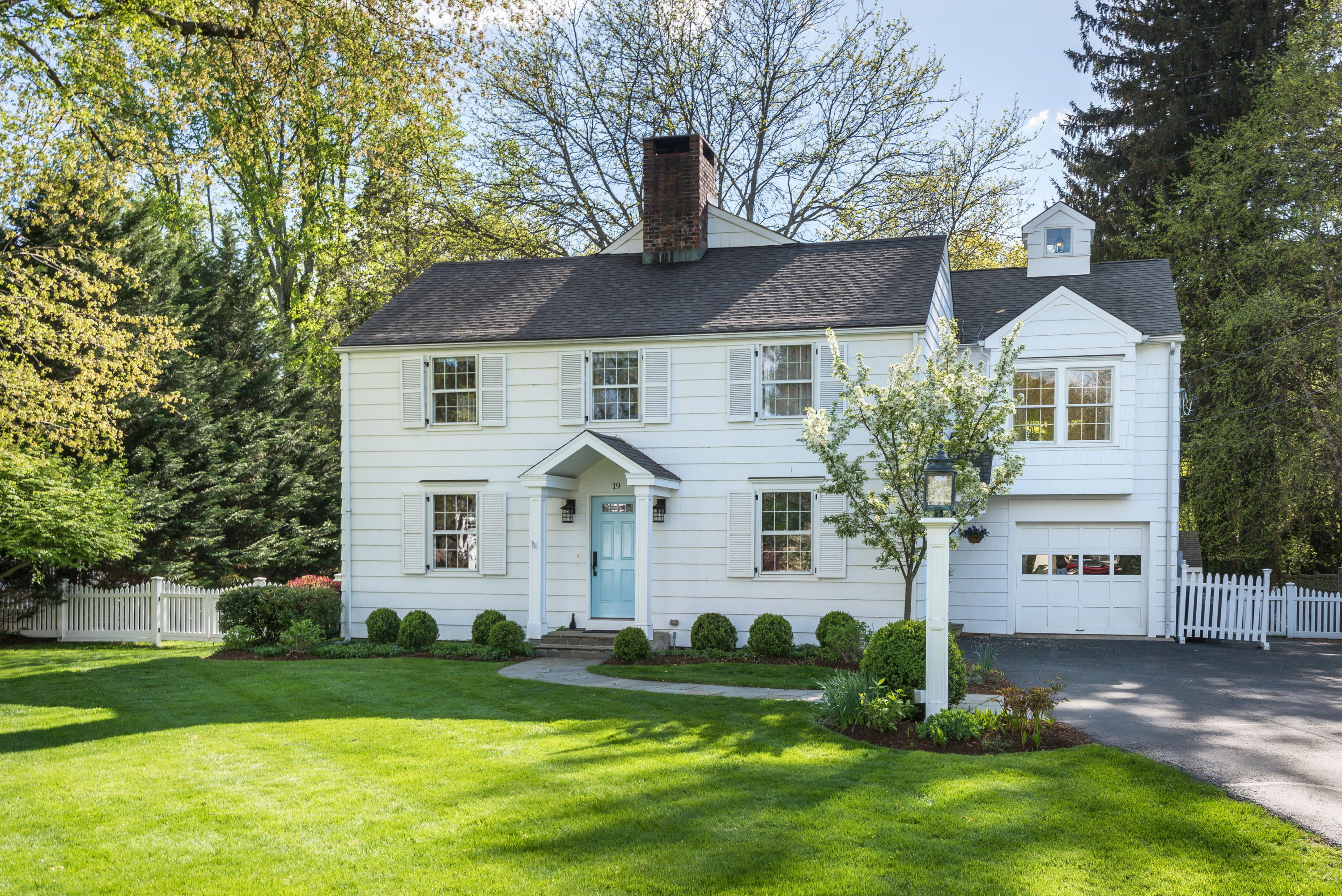 19 Birch Road Darien, CT 06820 - Photo 20 of 21 a front view of a house with a yard