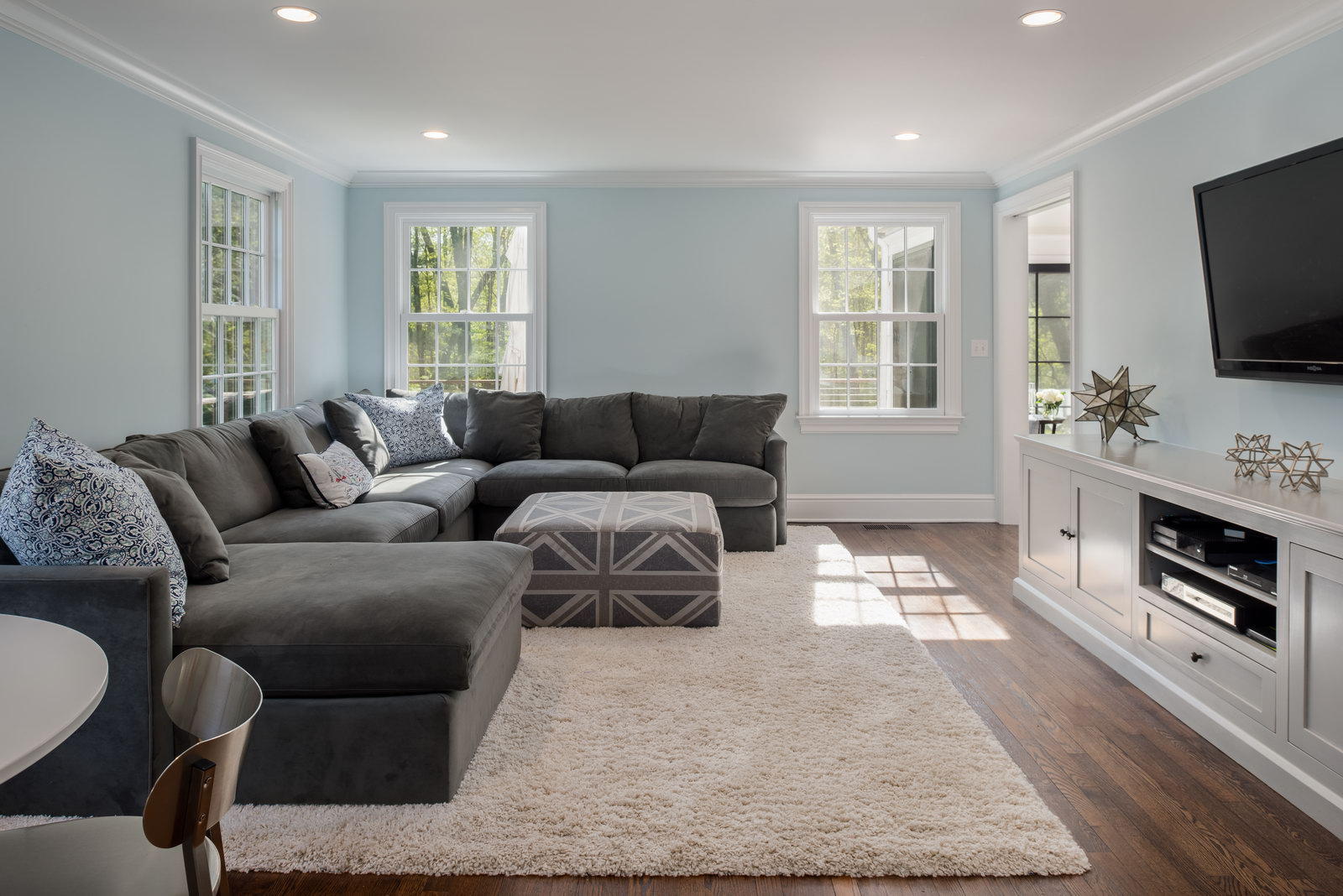 19 Birch Road Darien, CT 06820 - Photo 10 of 21 a living room with furniture and a flat screen tv