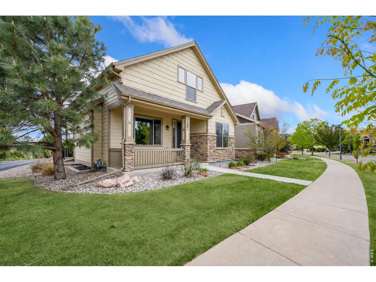 Welcome to 1809 Prairie Ridge!  Grass virtually greened up to show change of season