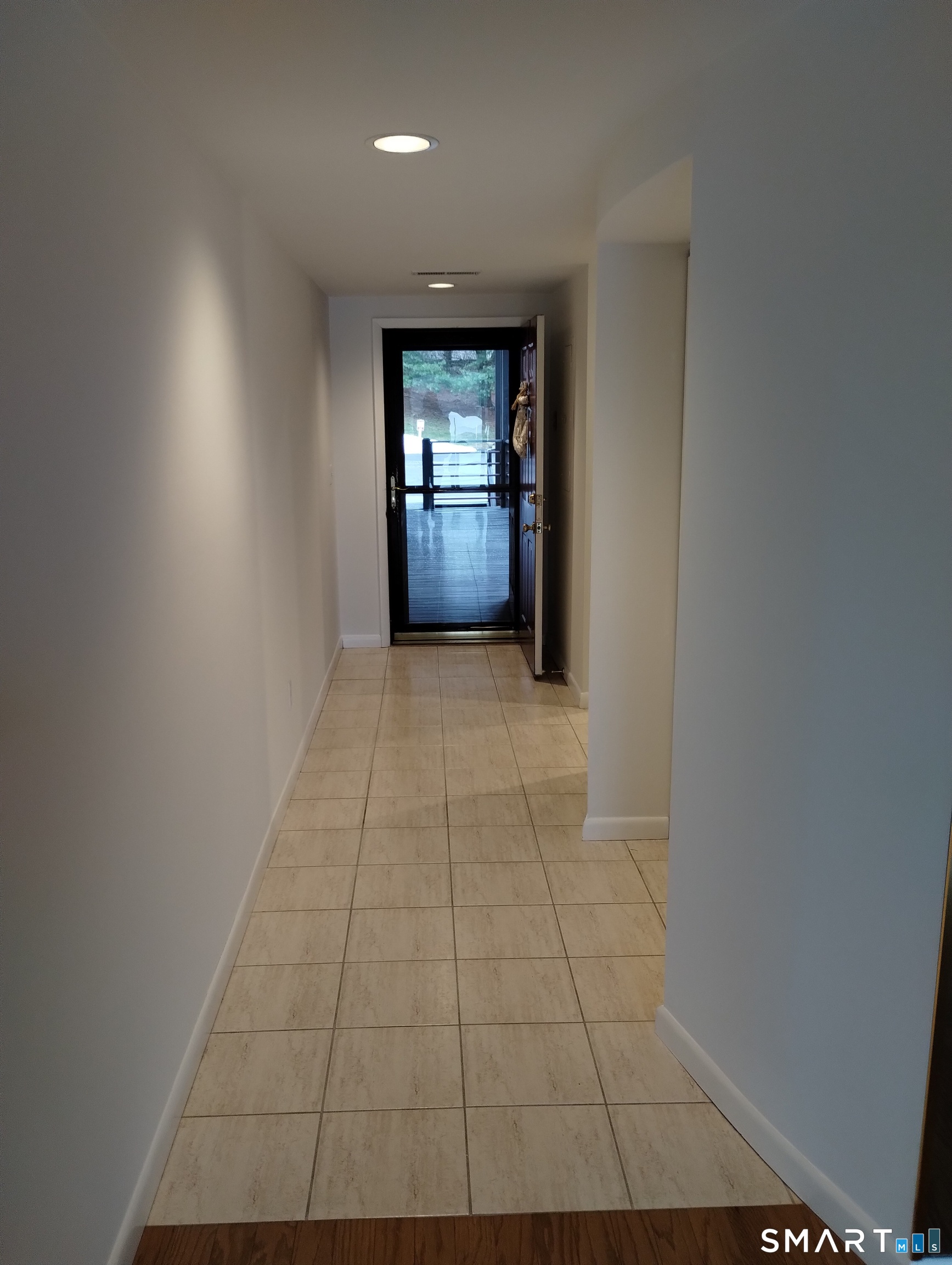 523 Popes Island Road, Unit 523 Milford, CT 06461 - Photo 4 of 33 a view of an empty room and window