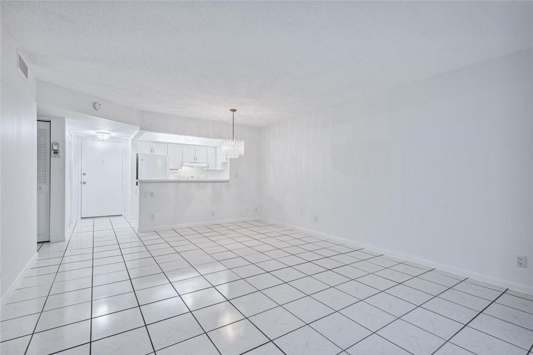 253 South Cypress Road, Unit 234 Pompano Beach, FL 33060 - Photo 5 of 15 a view of empty room