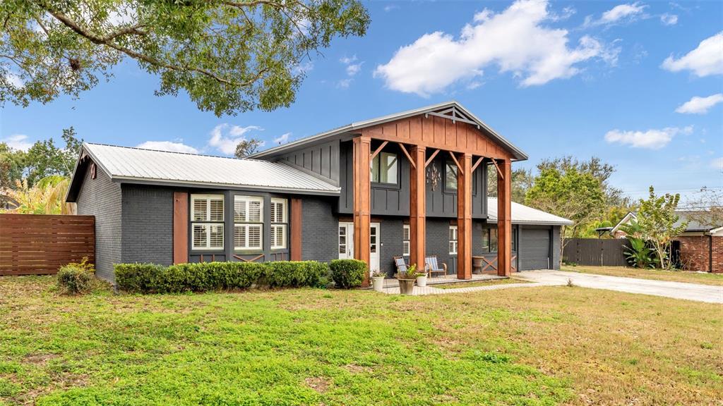 4623 Kings Point Court Lakeland, FL 33813 - Photo 20 of 61 a front view of a house with a yard