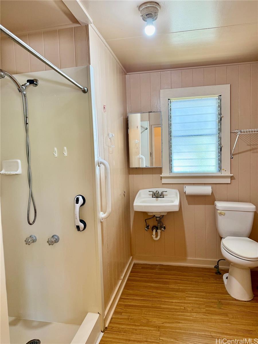 2816 Booth Road Honolulu, HI 96813 - Photo 7 of 17 a bathroom with a sink a toilet and shower