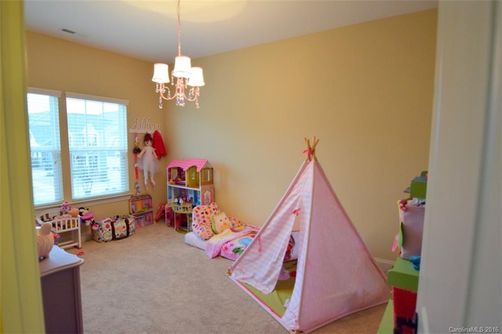 3034 Fallondale Road Waxhaw, NC 28173 - Photo 16 of 22 a view of a bedroom with windows