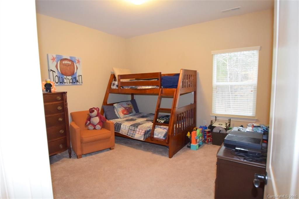 3034 Fallondale Road Waxhaw, NC 28173 - Photo 18 of 22 a bedroom with bed and a window