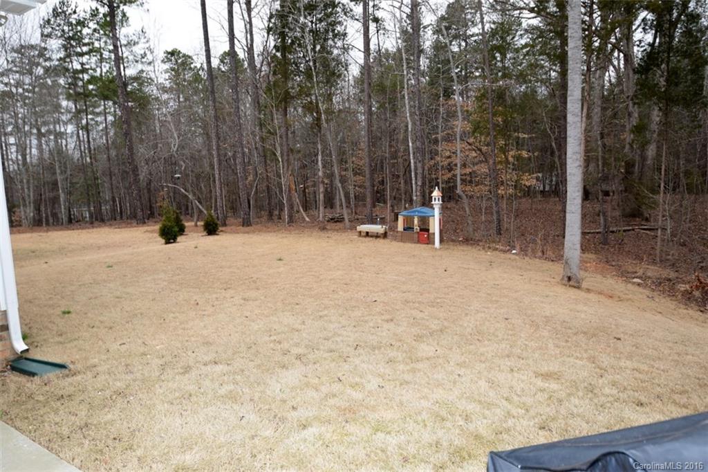 3034 Fallondale Road Waxhaw, NC 28173 - Photo 21 of 22 a view of outdoor space with trees