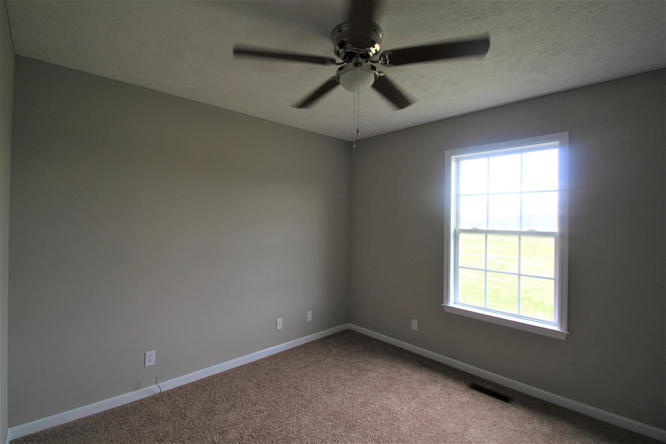 131 Spry Road Morrison, TN 37357 - Photo 9 of 11 an empty room with a window