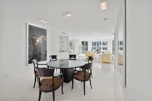 a bedroom with a bed and a desk