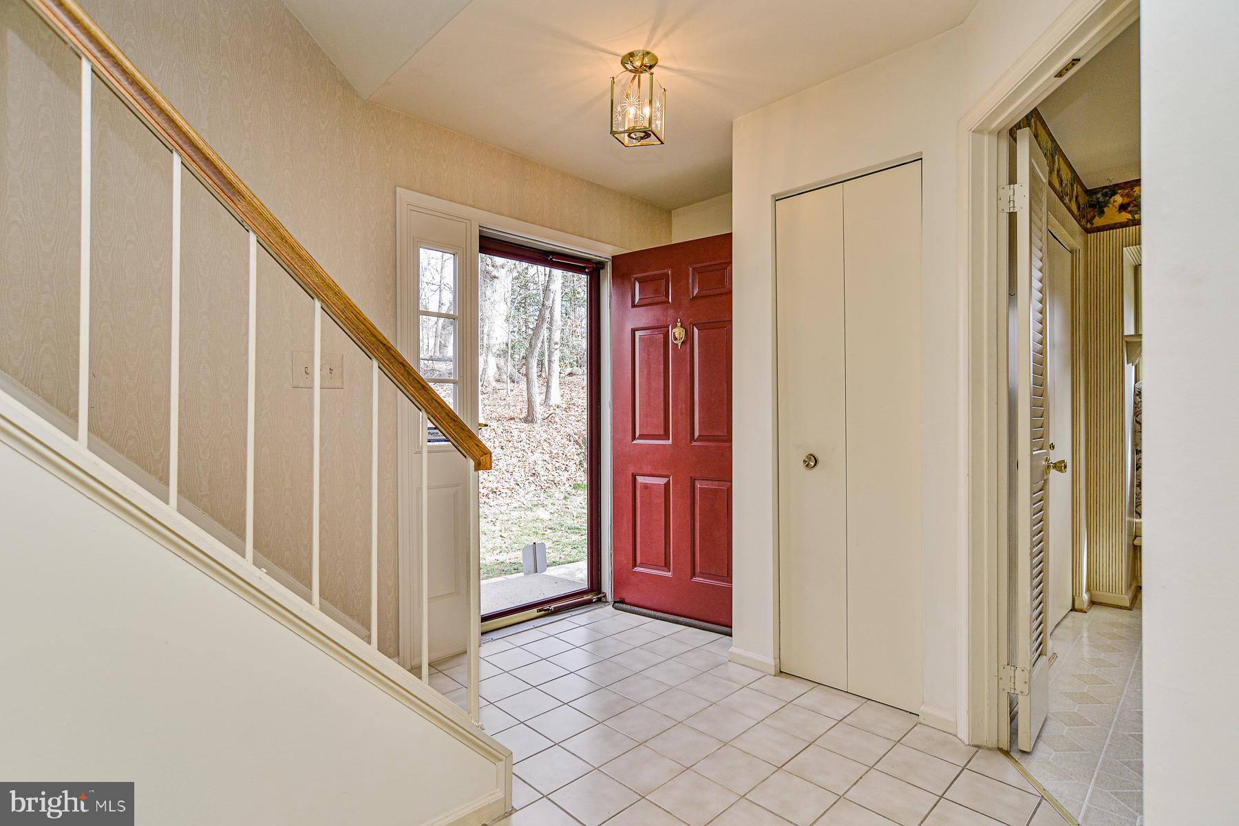 8557 Springfield Oaks Drive Springfield, VA 22153 - Photo 3 of 32 Open Foyer with tile floors