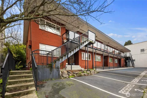 a view of a building with a street