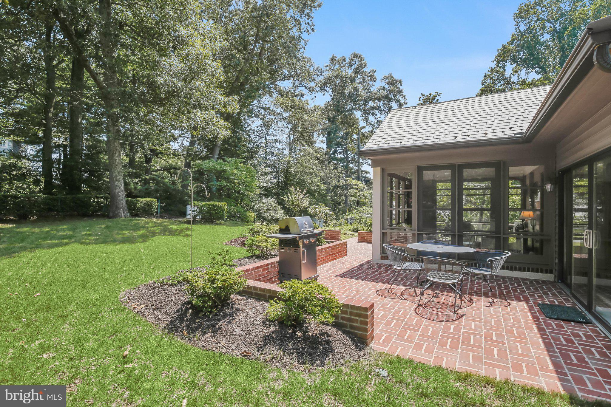 701 Stillwater Road Gibson Island, MD 21056 - Photo 7 of 29 Front Patio Overlooks Side Yard, Grilling Area
