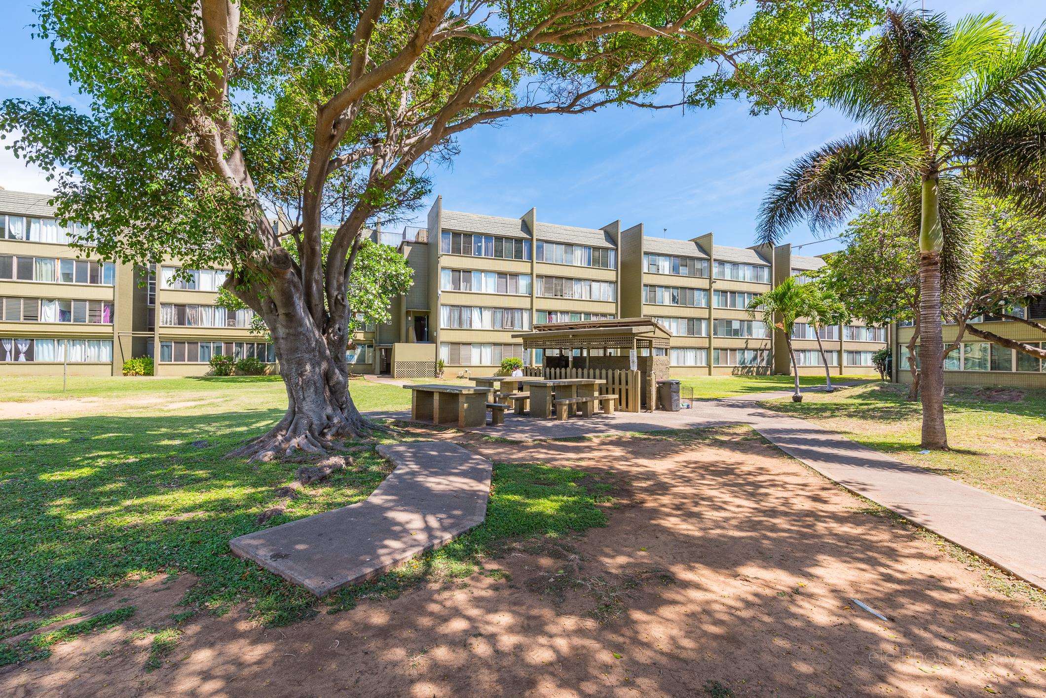 111 Kahului Beach Road, Unit B301 Kahului, HI 96732 - Photo 18 of 20 a view of a building with a yard