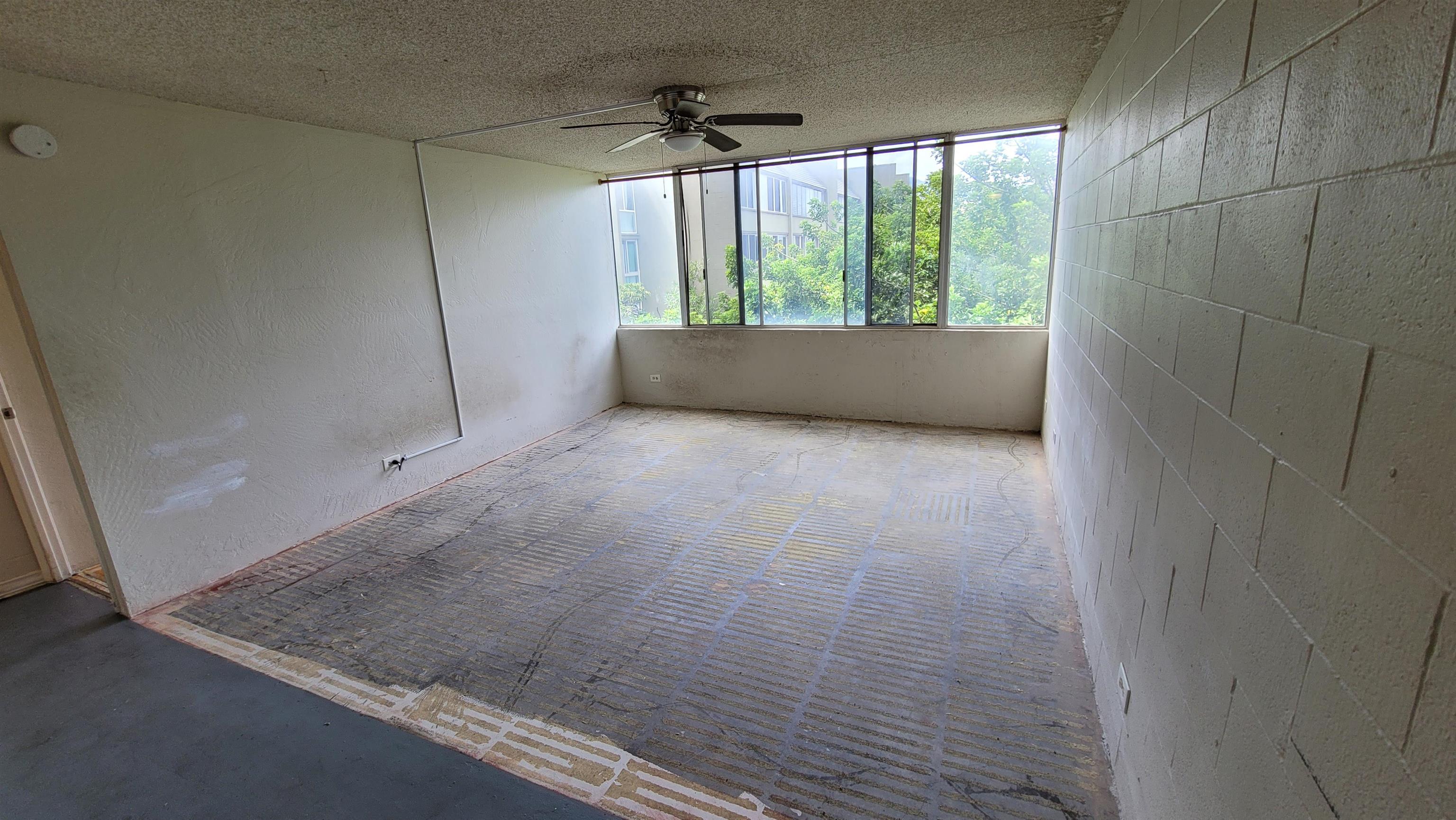 111 Kahului Beach Road, Unit B301 Kahului, HI 96732 - Photo 4 of 20 a view of an empty room with a window