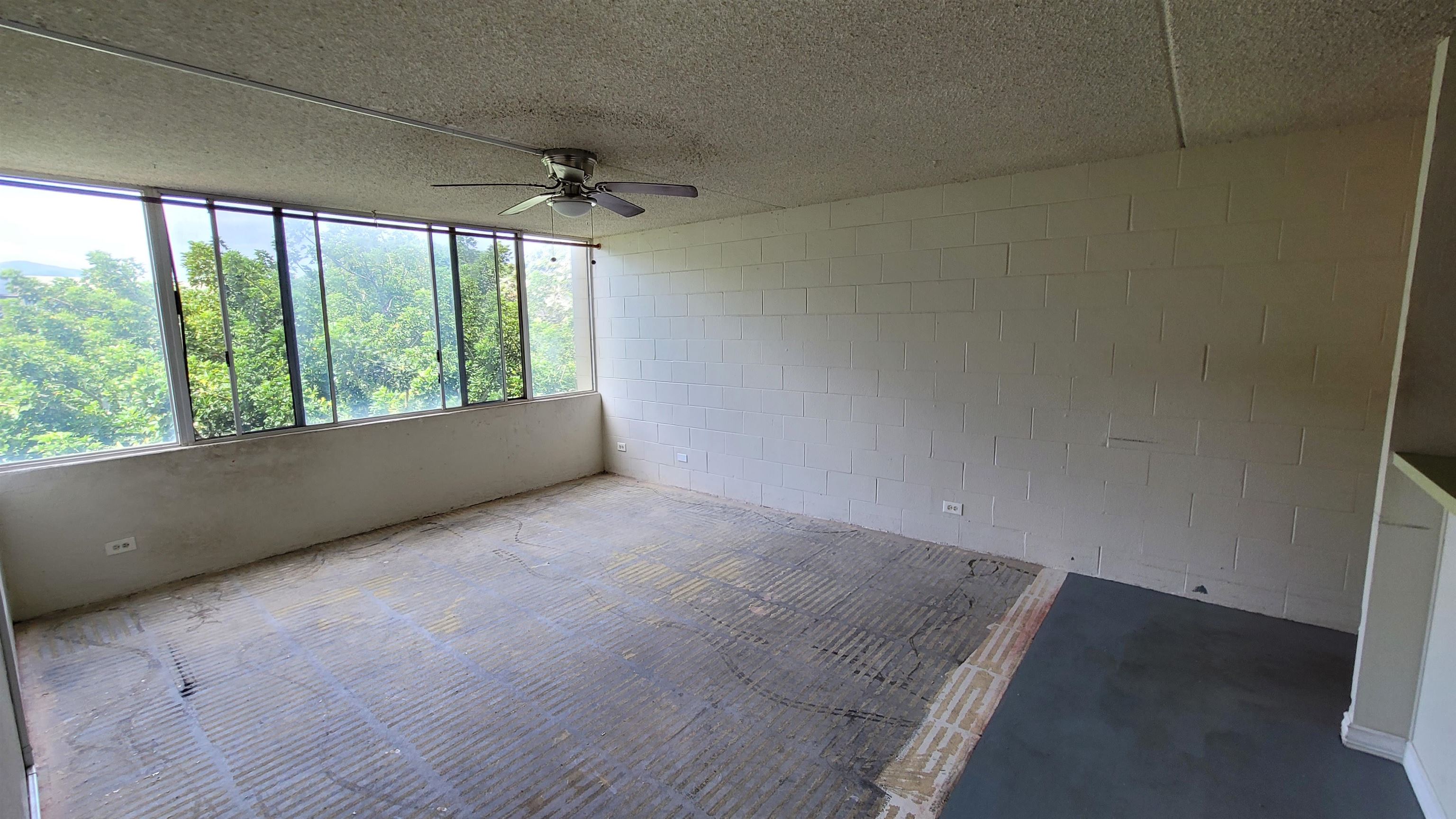 111 Kahului Beach Road, Unit B301 Kahului, HI 96732 - Photo 6 of 20 an empty room with a window
